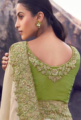 cream & green tissue silk blend blend jacquard woven with embroidered border saree with blouse 3