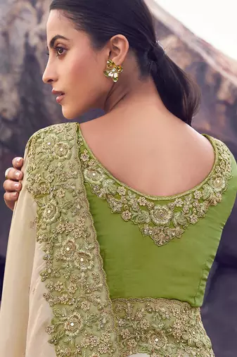 cream & green tissue silk blend blend jacquard woven with embroidered border saree with blouse