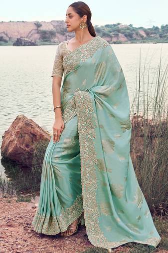 sky blue tissue silk blend jacquard woven with embroidered border saree with blouse