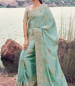 sky blue tissue silk blend jacquard woven with embroidered border saree with blouse