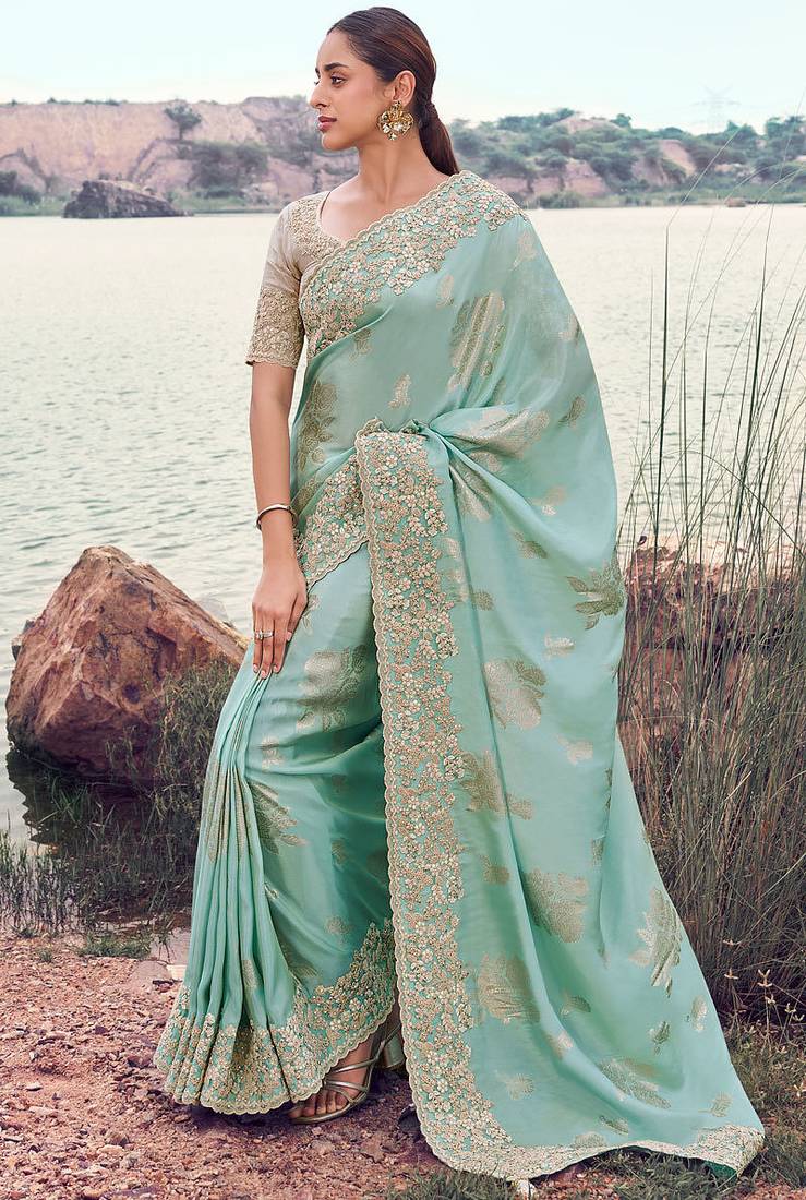 sky blue tissue silk blend jacquard woven with embroidered border saree with blouse