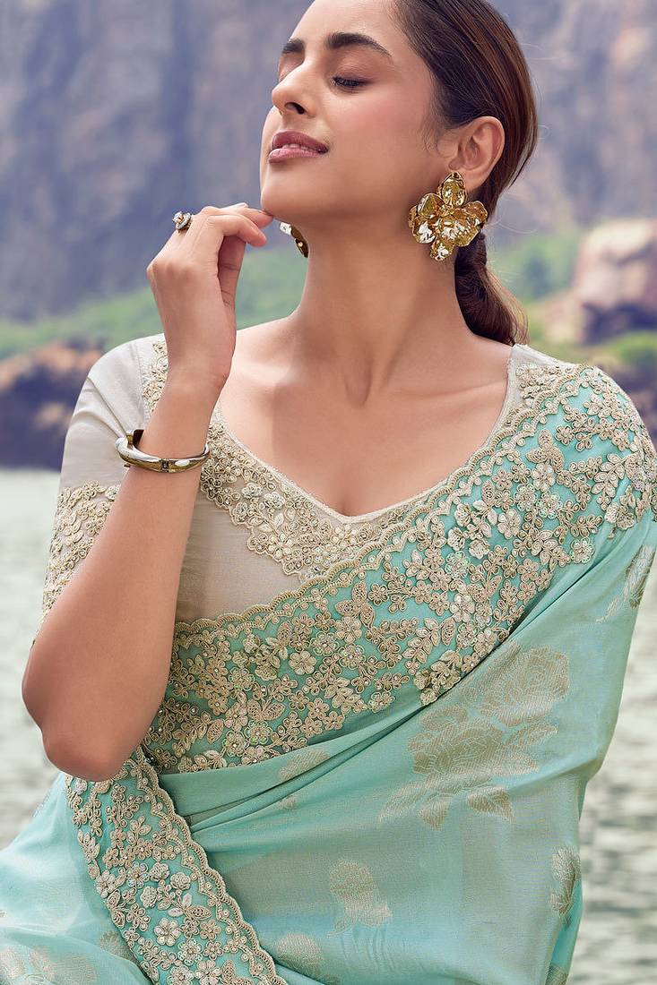 sky blue tissue silk blend jacquard woven with embroidered border saree with blouse