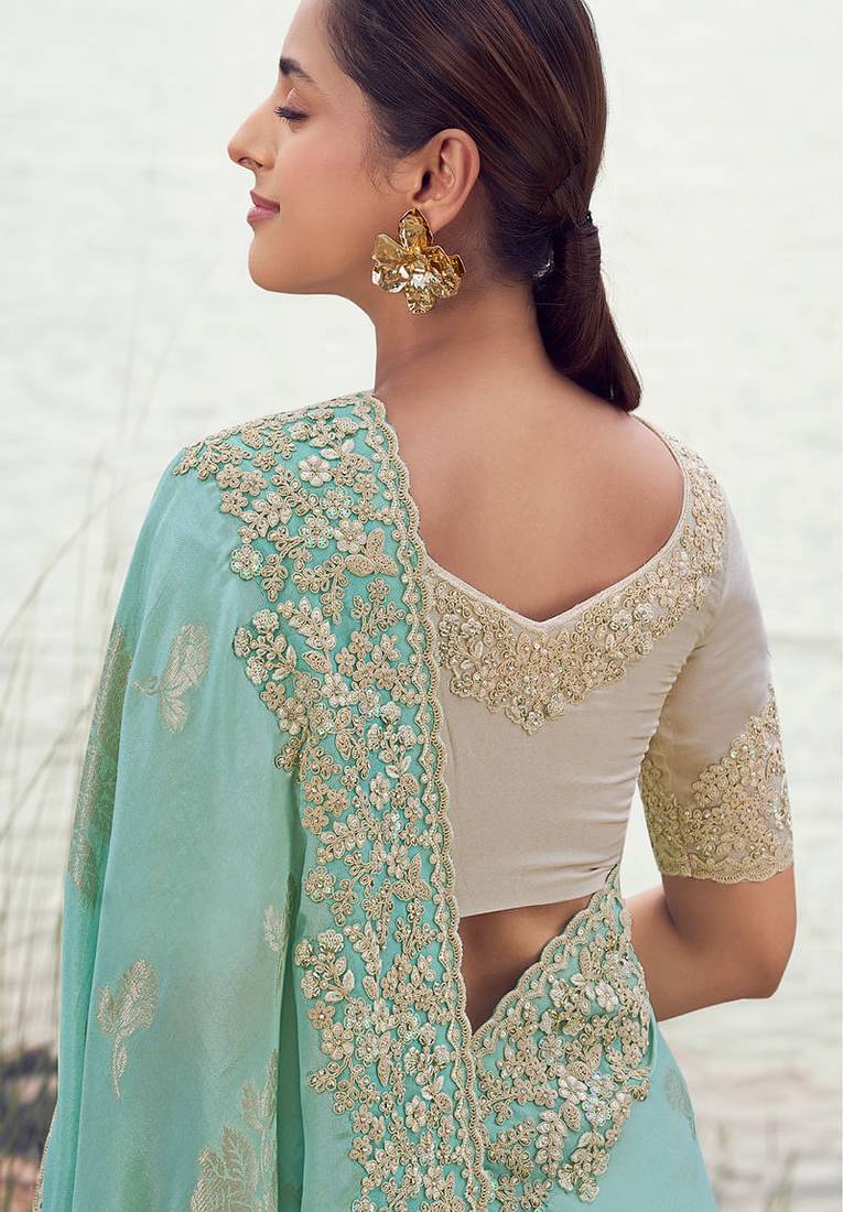 sky blue tissue silk blend jacquard woven with embroidered border saree with blouse