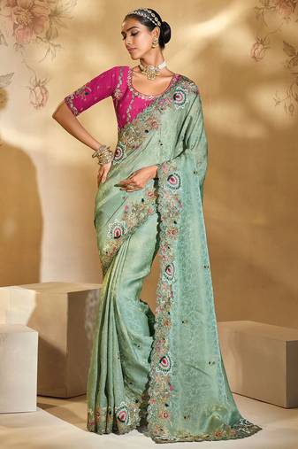 sea green kanjipuram silk blend jari, thread, moti, cut-dana with mirror heavy work saree with blouse