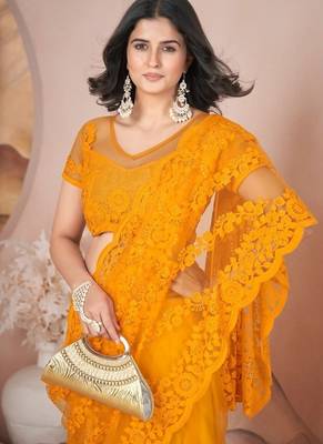 Yellow heavy butterfly net tone to tone aari embroidery work saree with blouse 5