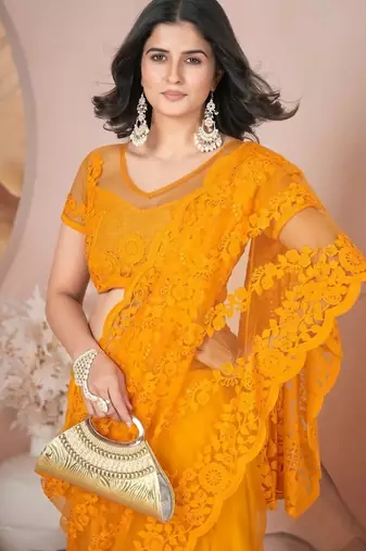 Yellow heavy butterfly net tone to tone aari embroidery work saree with blouse