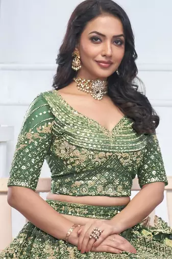 green embroidered net lehenga choli With Dupatta