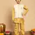 Boys yellow cotton silk kurta & pyjama set with jacquard nehru jacket