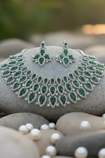 Silver polish bridal necklace set with green doublets & cz stones