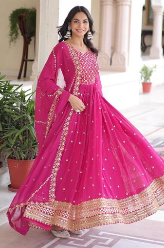 Pink faux georgette sequins & zari embroidered flared gown with heavy dupatta