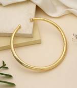 Gold color amrapali hansli necklace crafted with traditional detailing for elegant festive wear