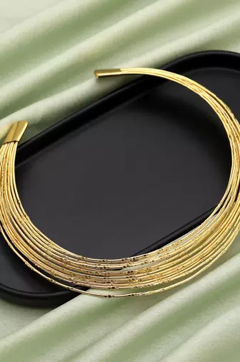 Stylish gold color amrapali hansli necklace designed to enhance classic ethnic necklace styling beautifully