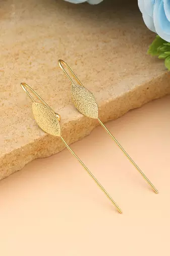 Gold color earcuff featuring artistic traditional craftsmanship created for striking festive elegance