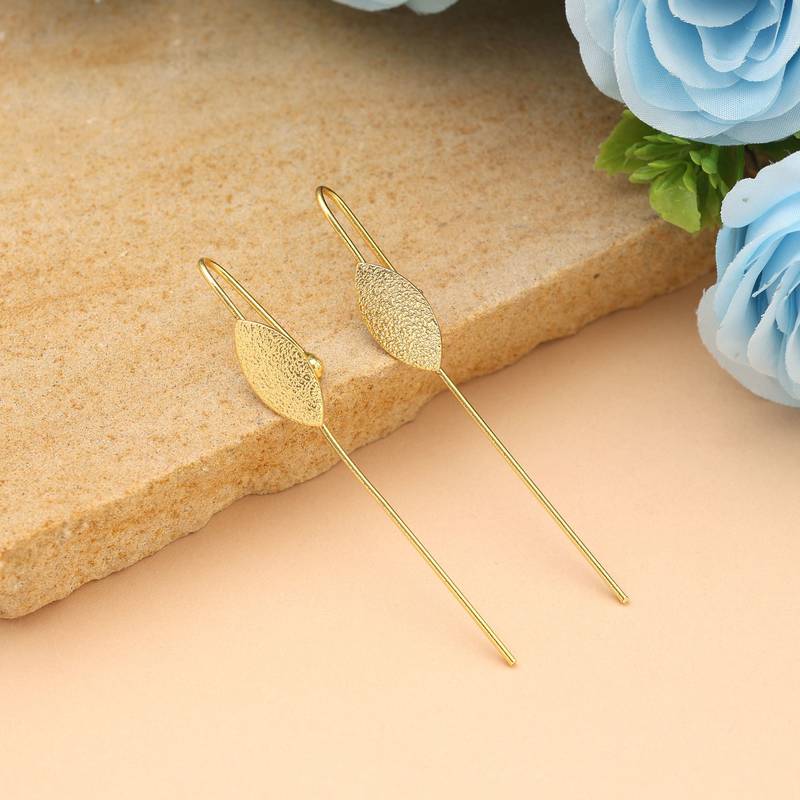 Gold color earcuff featuring artistic traditional craftsmanship created for striking festive elegance