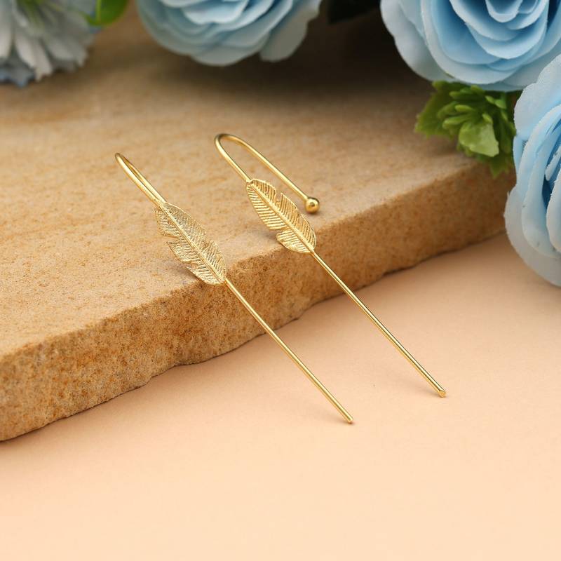 Gold color earcuff offering modern yet traditional charm perfect for festive jewelry lovers