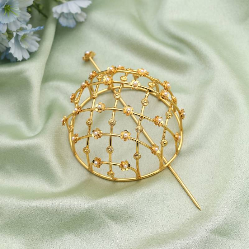 Gold color hair pin beautifully crafted to enhance elegant traditional hairstyles for festive occasions