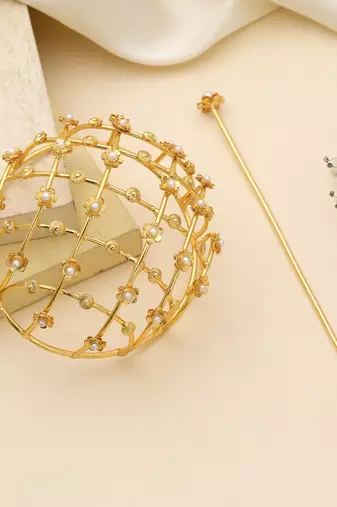 Gold color hair pin beautifully crafted to enhance elegant traditional hairstyles for festive occasions
