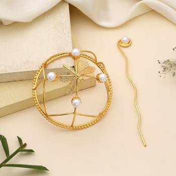 Stylish gold color hair pin designed to add graceful charm to ethnic hair fashion 2
