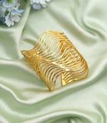 Gold color bracelet crafted with elegant traditional detailing for timeless festive and wedding wear