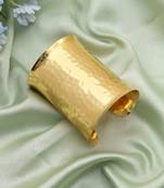 Gold color bracelet featuring intricate patterns perfect for elevating traditional fashion effortlessly