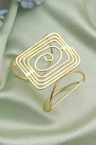 Gold color bracelet showcasing delicate artisanal work ideal for weddings and special ethnic occasions