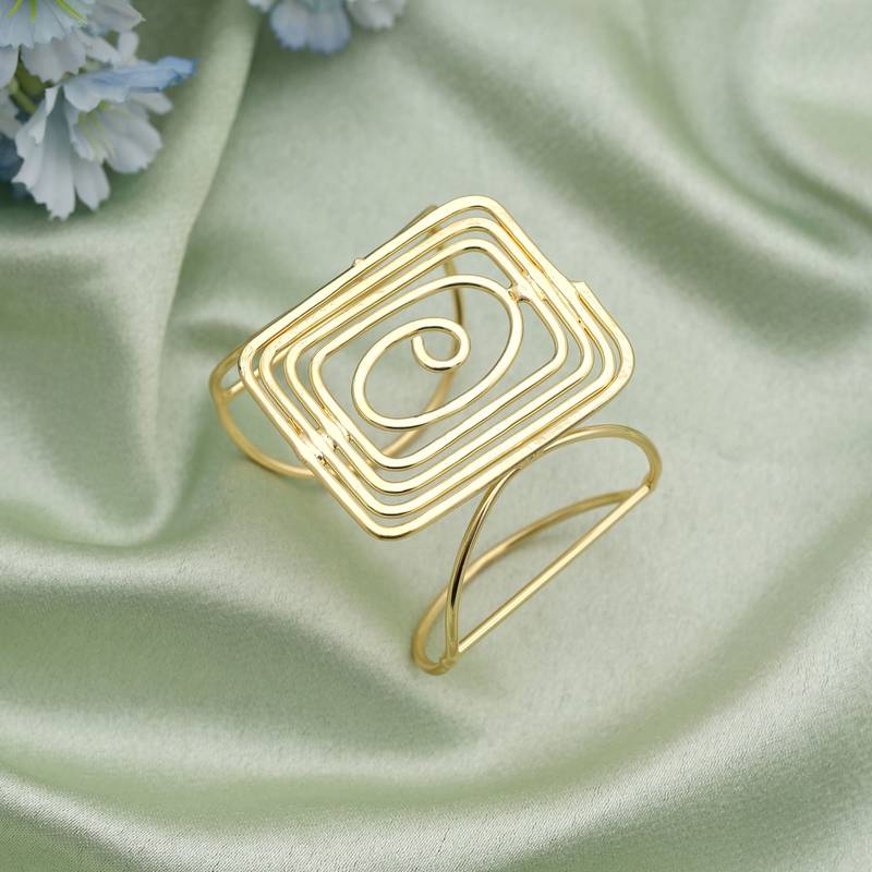 Gold color bracelet showcasing delicate artisanal work ideal for weddings and special ethnic occasions