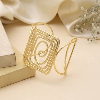 Gold color bracelet showcasing delicate artisanal work ideal for weddings and special ethnic occasions 2