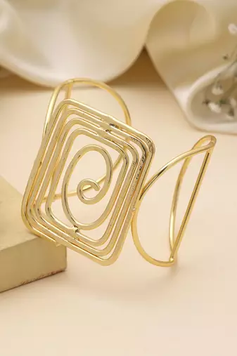Gold color bracelet showcasing delicate artisanal work ideal for weddings and special ethnic occasions