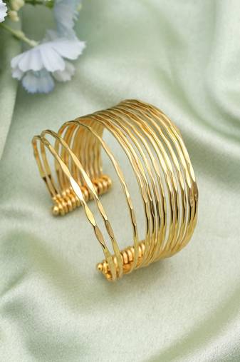 Charming gold color bracelet perfect for adding sophisticated glow to every traditional celebration