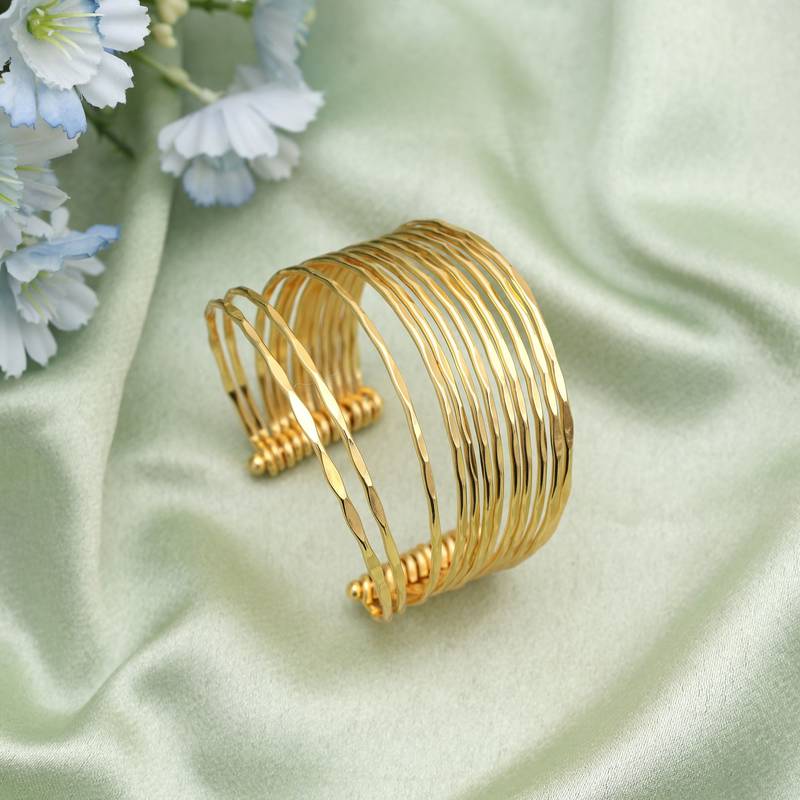 Charming gold color bracelet perfect for adding sophisticated glow to every traditional celebration