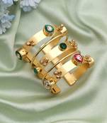 Gold color bracelet designed for graceful ethnic styling with a luxurious classic aesthetic