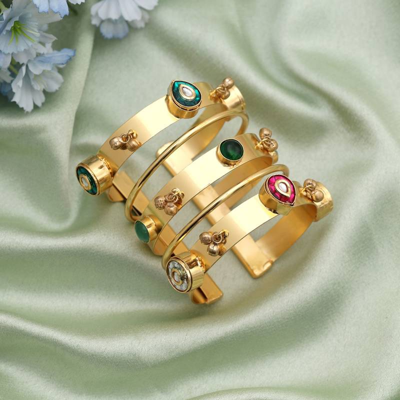 Gold color bracelet designed for graceful ethnic styling with a luxurious classic aesthetic