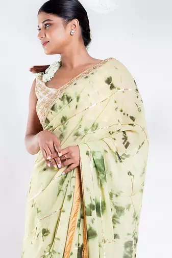 georgette saree in olive and green tie n dye with gota and golden zari border