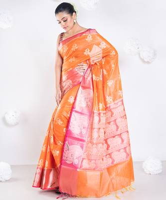 banarasi organza saree in burnt orange color with floral motifs and contrasting border 2