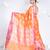 banarasi organza saree in burnt orange color with floral motifs and contrasting border