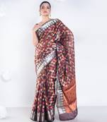 banarasi kora organza saree in chocolate brown color with multicolor motifs with copper zari