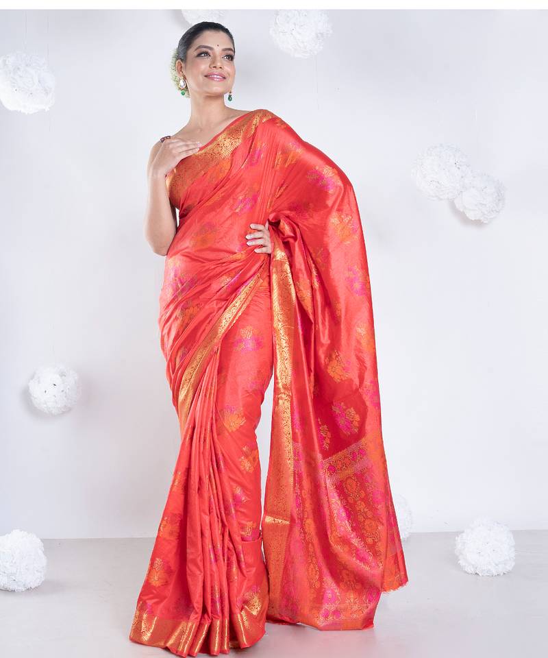 banarasi ari silk blend saree in rust color with multicolor motifs and zari border