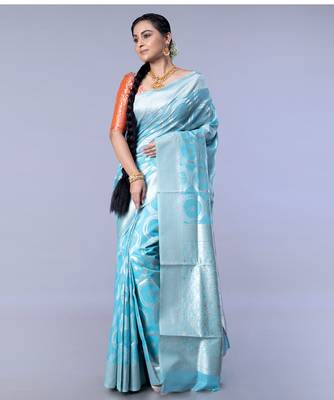 silk blend blend chanderi saree in blue color with dull gold zari circular motifs 1