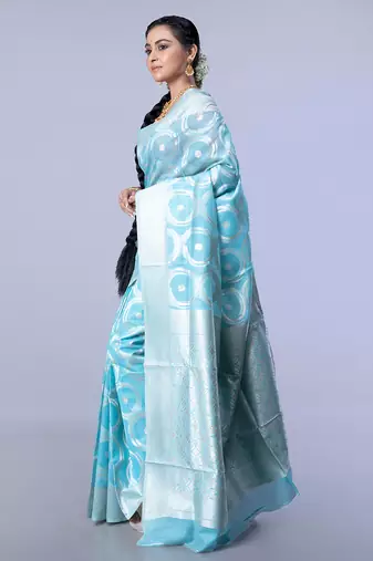 silk blend blend chanderi saree in blue color with dull gold zari circular motifs
