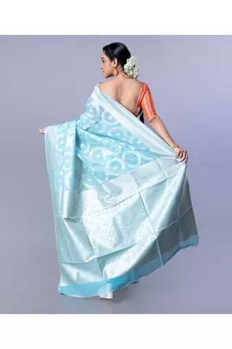 silk blend blend chanderi saree in blue color with dull gold zari circular motifs