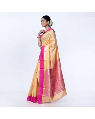kanjivaram saree in beige color with contravention border and zari motifs 3