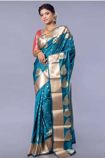 kanjivaram saree in blue color with golden border and booti