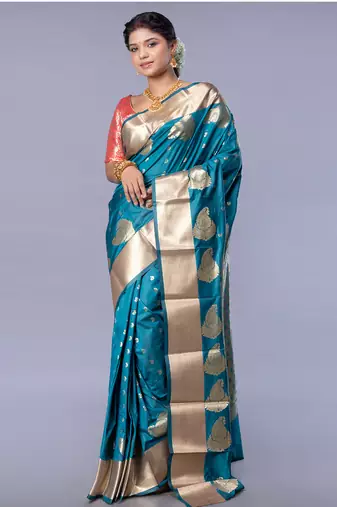 kanjivaram saree in blue color with golden border and booti