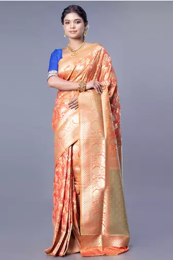 kanjivaram in tangerine orange color with zari floral jaal