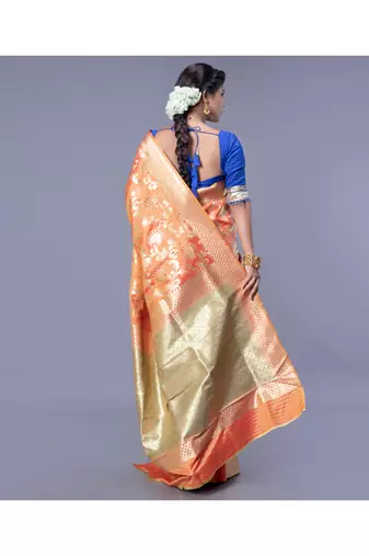 kanjivaram in tangerine orange color with zari floral jaal