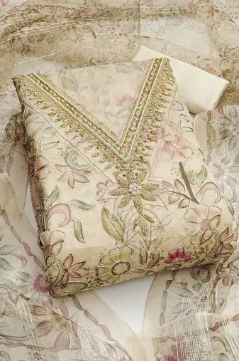 Off white color sequence heavy organza straight churidar dress material