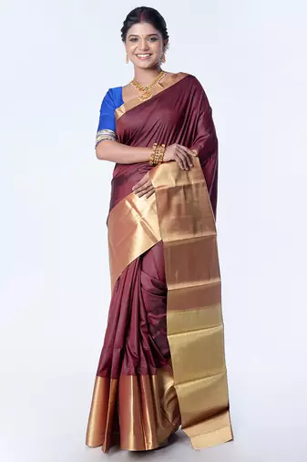 Kanjivaram saree in dark maroon color with golden mahapar border