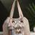 folklore edit beige cotton chevron embellished hobo bag