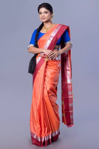 Kanjivaram silk saree in rust color with maroon and silver border