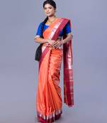 Kanjivaram silk saree in rust color with maroon and silver border